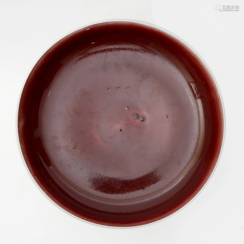 A RED GLAZE PLATE