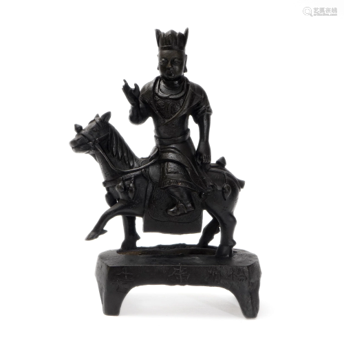 A STATUE OF ZHENG CHENGGONG RIDING A HORSE