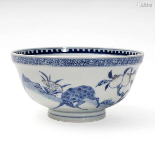 A BLUE AND WHITE UNDERGLAZED RED BOWL WITH DE…