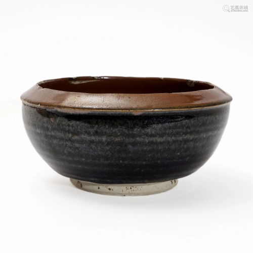 A BLACK GLAZED BOWL