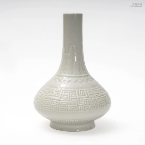 A WHITE-GLAZED WATER CHESTNUT-SHAPED BOTTLE WITH DA…