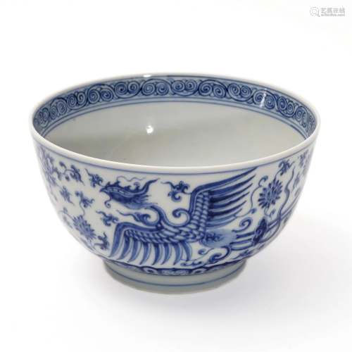 A BLUE AND WHITE BOWL WITH PHOENIX PATTERN