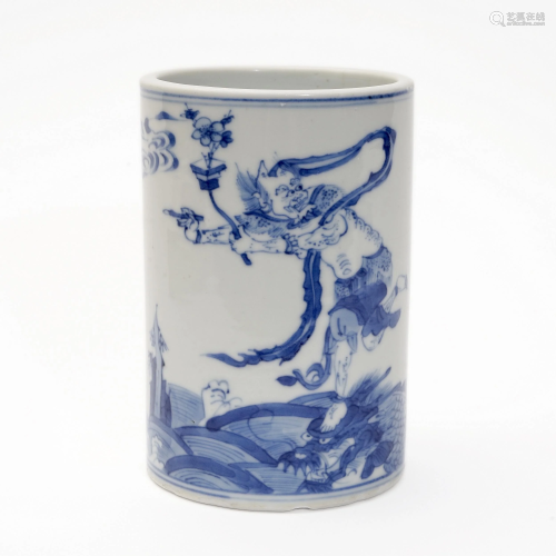 A BLUE AND WHITE PEN HOLDER, PAINTED WITH CHARACTERS