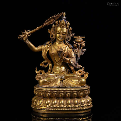 A GILT BRONZE BUDDHA STATUE