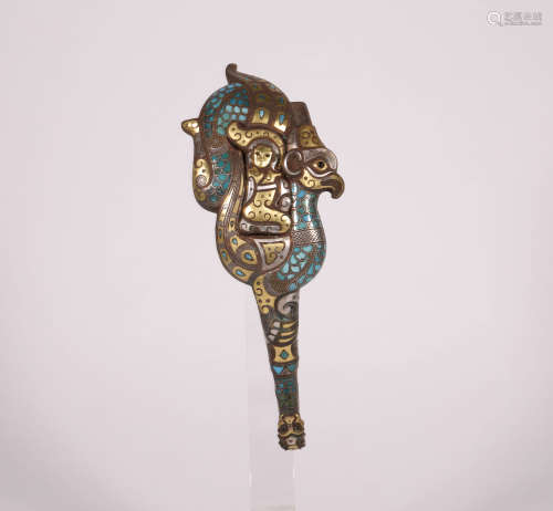 A BRONZE BELT HOOK WITH GOLD SILVER AND TURQUOISE INLAYS