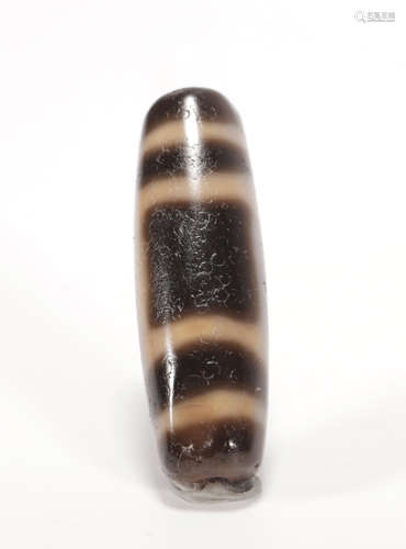 A TIBETAN OR CHINESE DZI TIANZHU BEAD