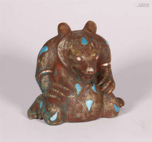 A VINTAGE BRONZE BEAR FIGURINE