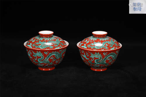 A PAIR OF PORCELAIN LIDDED BOWLS