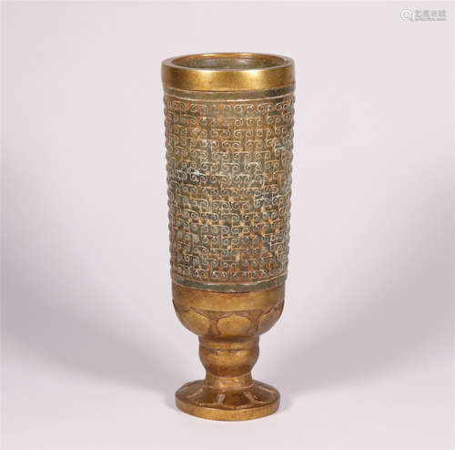 A GILT BRONZE CUP