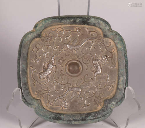 A LOBED-SHAPE BRONZE MIRROR