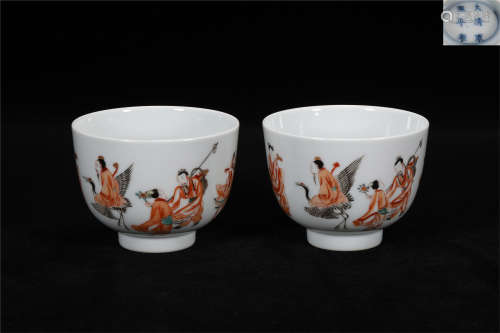 A pair of Qing Kangxi style red glaze porcelain cups
