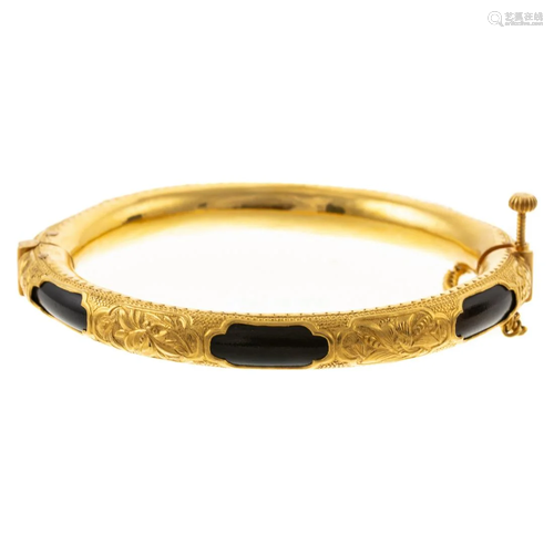 A 22K Chinese Black Coral Engraved Bangle, c.1930