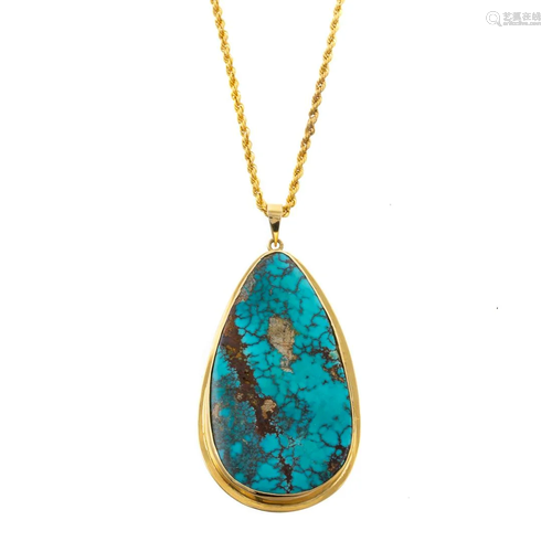 A Large Turquoise Pendant in 18K Yellow Gold