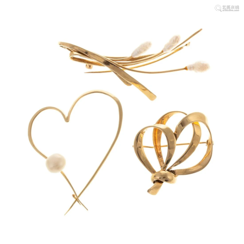 A Collection of 14K Yellow Gold Pearl Brooches
