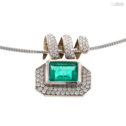 A Fine Emerald & Pave Diamond Pendant in 14K