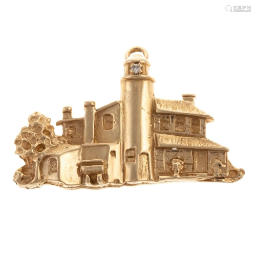 A Yellow Gold Lighthouse Pin/Pendant in 14K