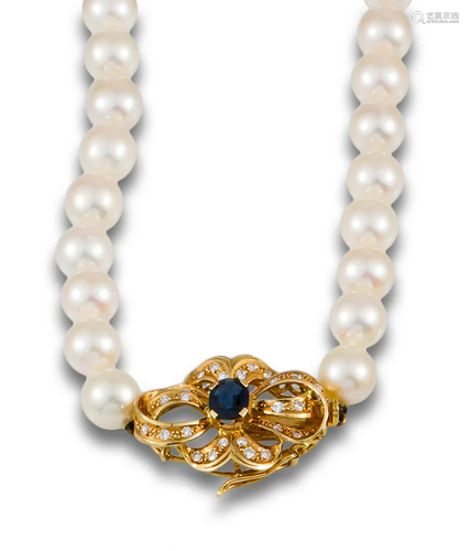 Pearl necklace with diamond and sapphire brooch