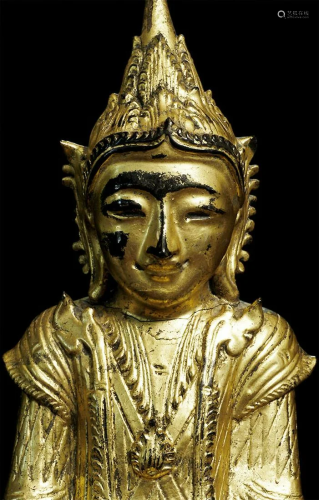 Antique lacquer Burmese Buddha in Royal attire.
