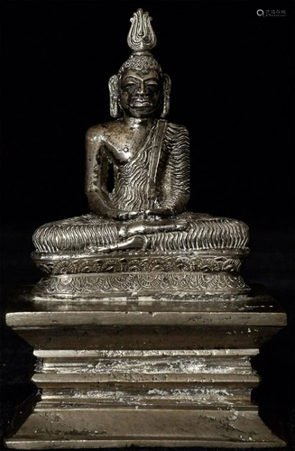 Solid silver 18thC Lankan Buddha on silver metal base.