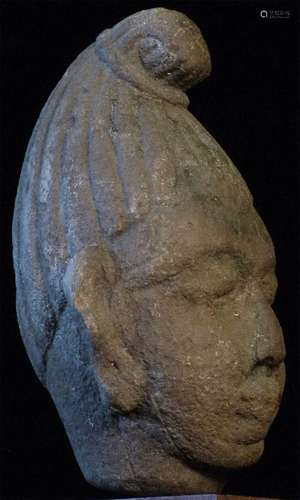 Sensitively modeled early SE Asian stone head.