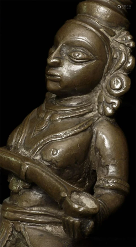 This is an antique bronze casting of Annapurna,