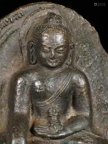 Early Himalayan Buddha atop a pair of powerful