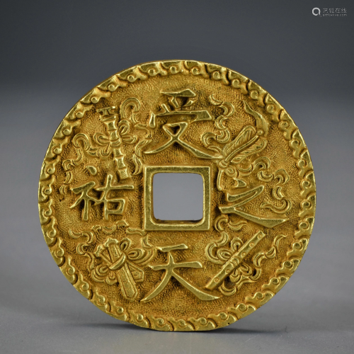 A Gilr-bronze Coin