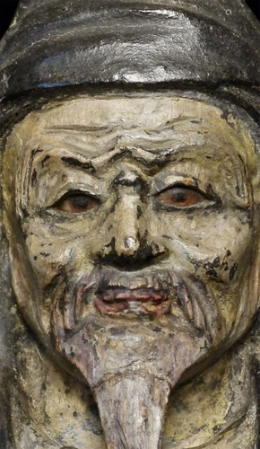 Edo period Japanese figure with glass eyes.