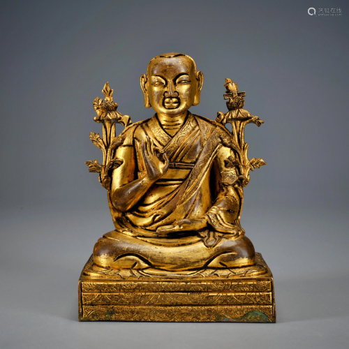 A Gilt-bronze Seated Master Qing Dynasty