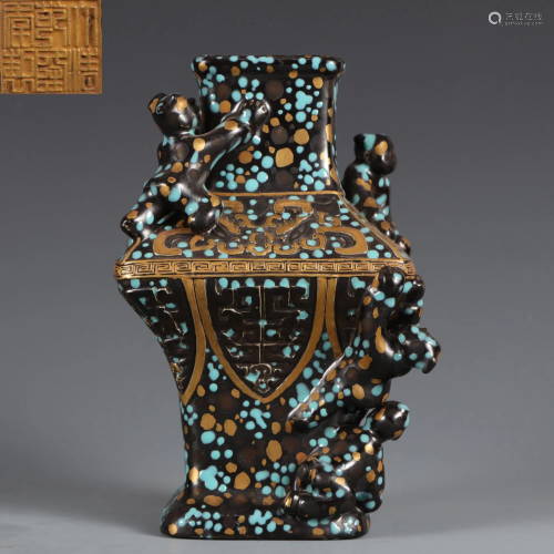 A Black Glaze and Gilt Vase