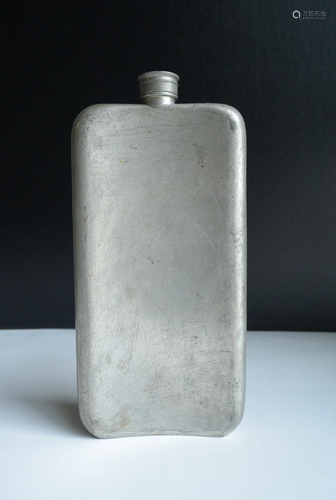 A rare antique pewter portable wine vessel