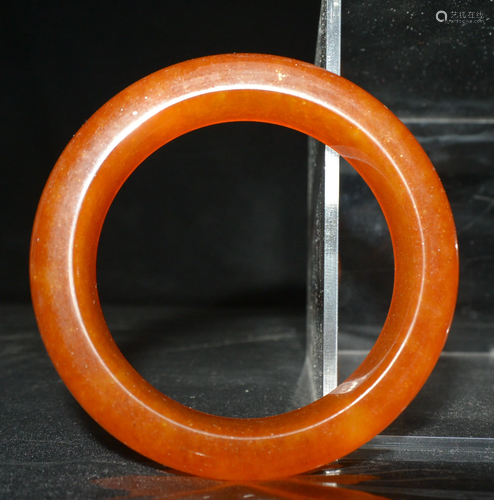 A SUGAR JADE BANGLE