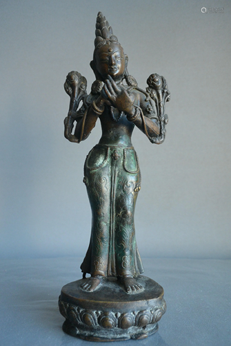 A finely bronze green Tara, H24.5cm.