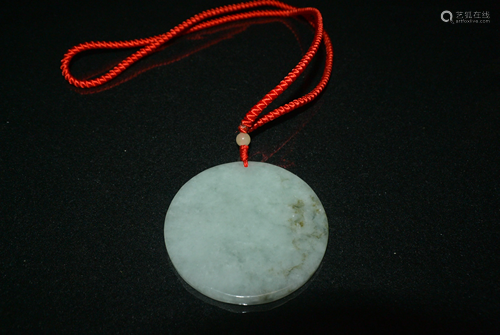 AN ICE JADEITE PENDANT