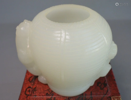A finely White jade carved lion handle water pot