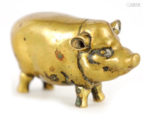 A 19TH CENTURY BRASS VESTA CASE FORMED AS A PIG wi