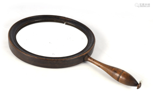A GEORGE III CONCAVE MAGNIFYING HAND MIRROR with m