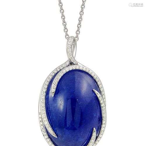 Pendentif or blanc centré d'une très importante Tanzanite ov...