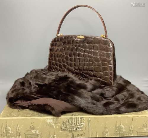 A Russell & Bromley brown crocodile effect handbag (made in ...