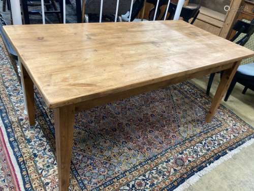A rectangular pine kitchen table, width 160cm, depth 79cm, h...