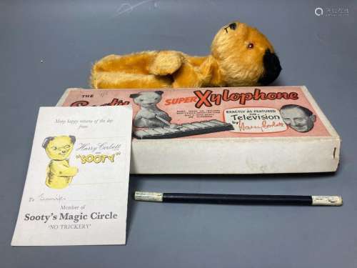 A 1950's Chad Valley Sooty hand puppet with wand, birthday c...