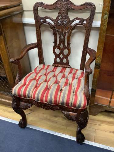 A pair of George III style Irish design mahogany elbow chair...