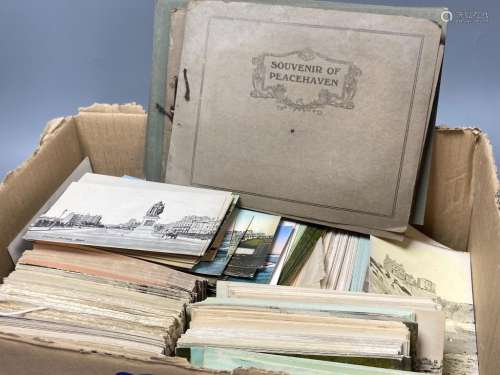 A collection of unused early 20th century postcards, largely...