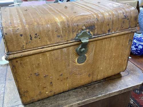 A Victorian tin trunk 'The Albert' with painted simulated oa...