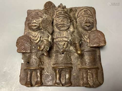 A Benin style bronze plaque, width 17cm, height 17cm