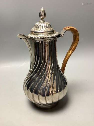 A George III silver hot water jug of wrythen baluster form,L...