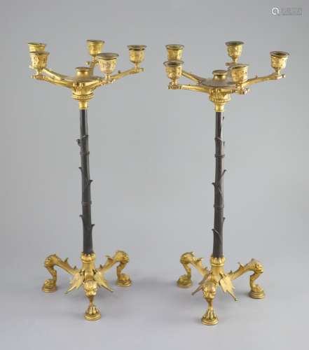 A pair of Barbedienne style five branch ormolu candelabra, 1...