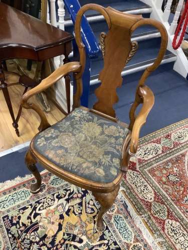 A Queen Anne revival walnut elbow chair