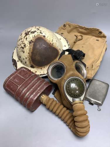 A WWII helmet, a gas mask, etc.