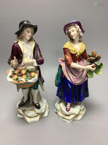 A pair of Continental porcelain figures, height 24cm